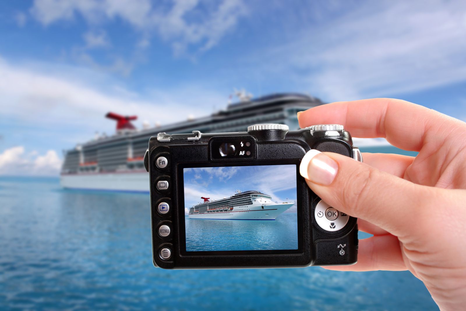 Digital camera - taking picture of cruise ship